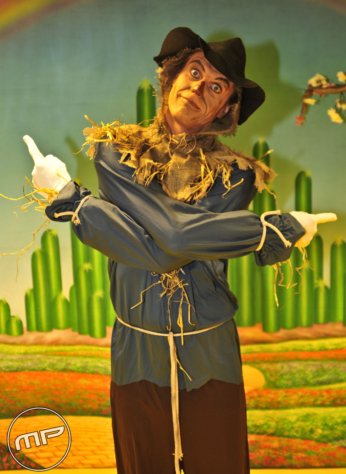 scarecrow wizard of oz with a gun