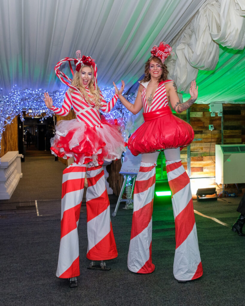 Area51's candy cane themed stilt walker at the Heart of England Conference & Events centre for Krispy Kreme Doughnuts.